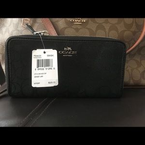 Black signature Coach wallet